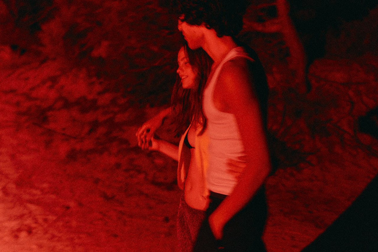 Couple together in red light